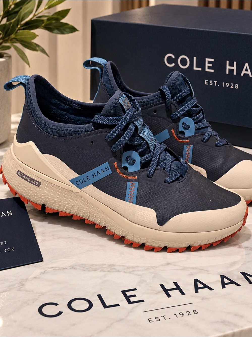 Cole Haan Men’s Navy Blue and Cream Grand 360 Trail Sneakers with Orange Outsole